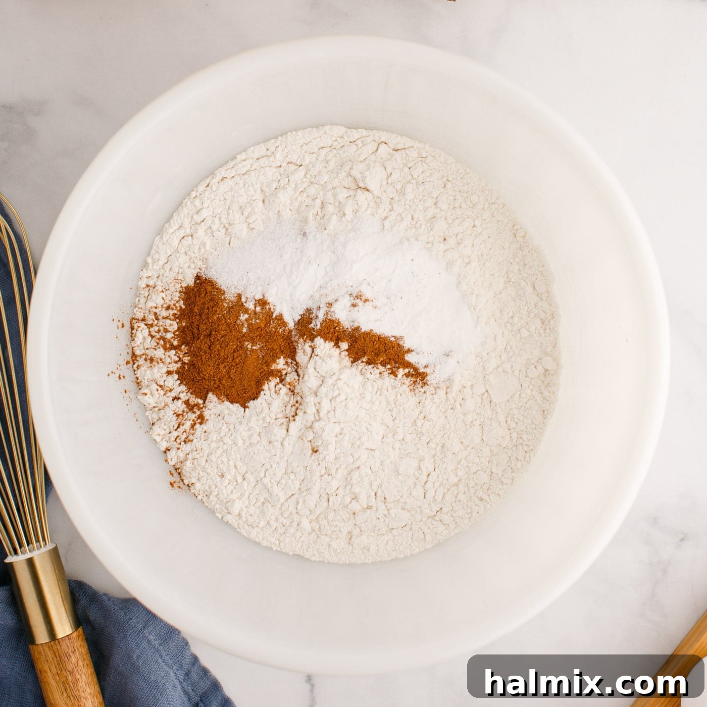 flour, baking powder, salt, and cinnamon in a bowl