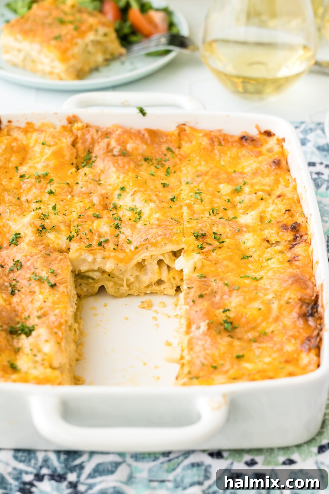 Fisherman's Lasagna 3 A full pan of baked Seafood Lasagna, showing the golden, bubbly cheese crust and the enticing layers within.