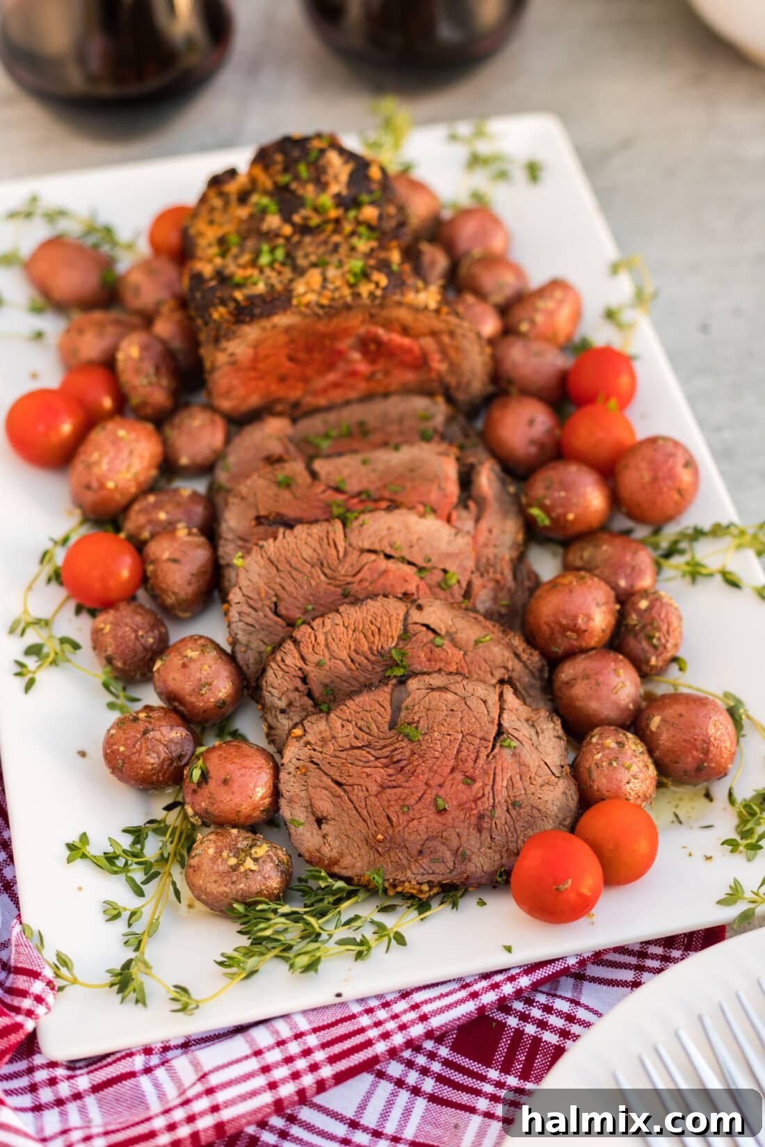 platter of Perfectly Cooked Beef Tenderloin, sliced and ready to serve