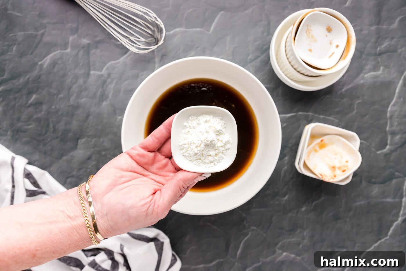 Combining all sauce ingredients for chow mein in a bowl