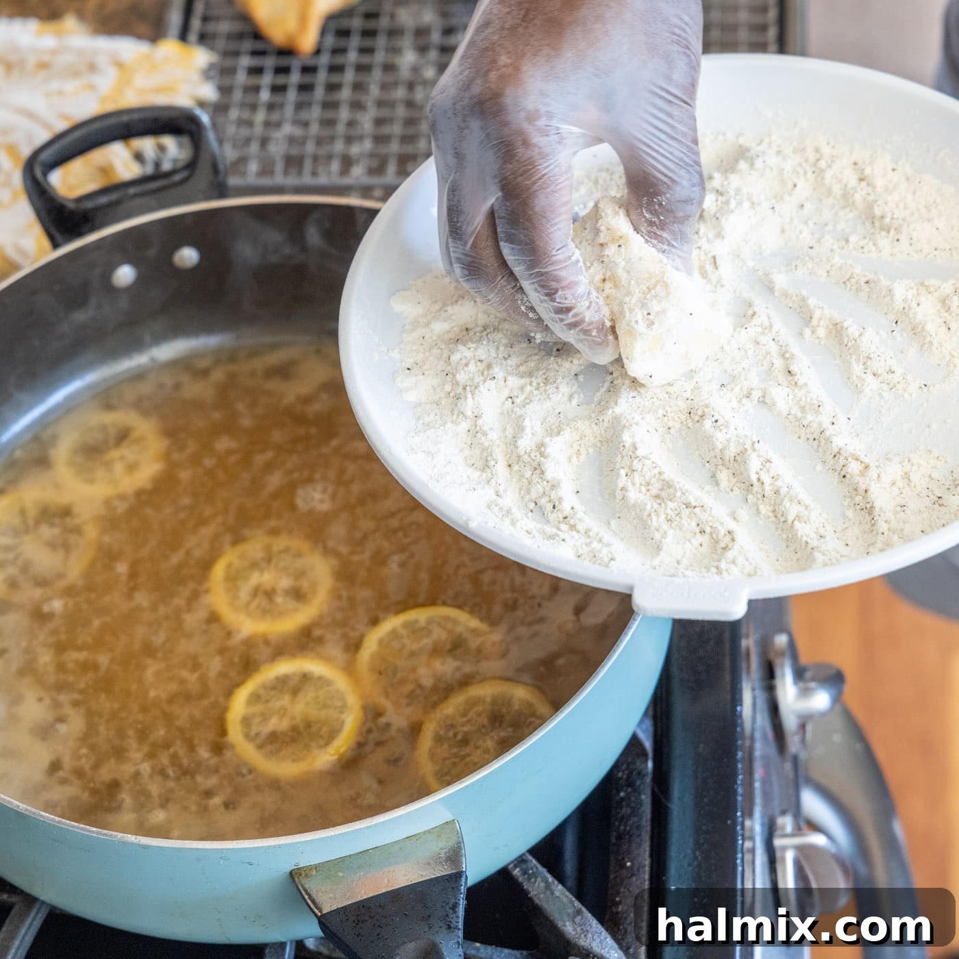 Coating Butter in Flour Coating a piece of butter in the remaining flour mixture