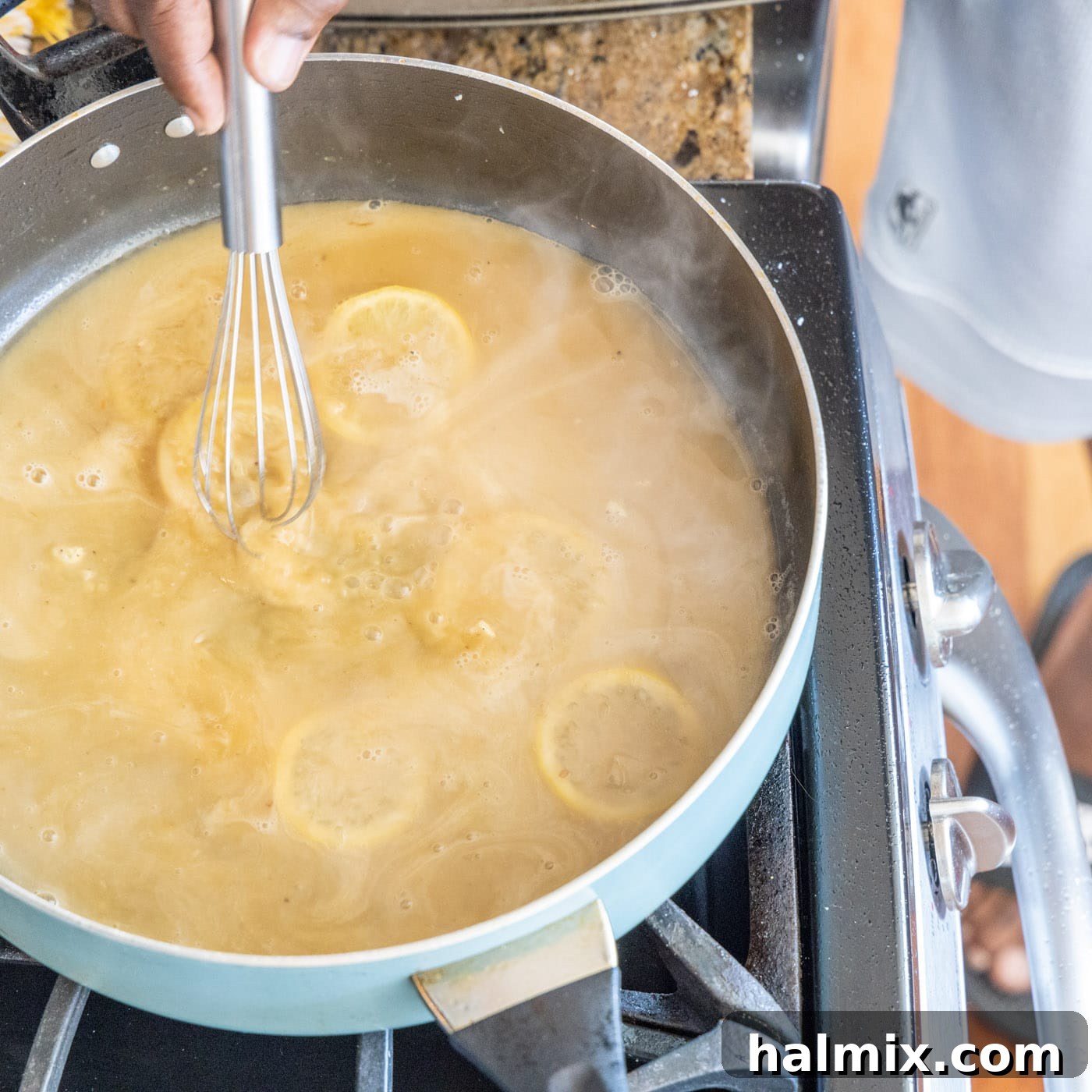 Thickening the Lemon Butter Sauce Whisking the butter and flour into the pan sauce with lemon to thicken it