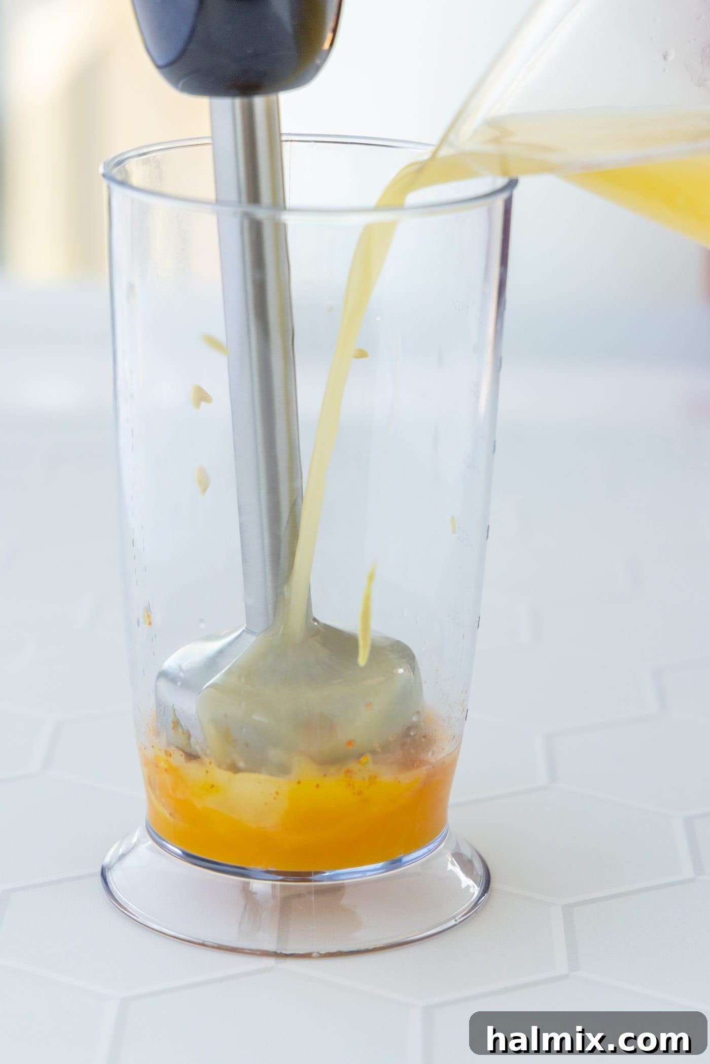 Velvety Hollandaise Sauce 5 immersion blender blending hollandaise sauce ingredients