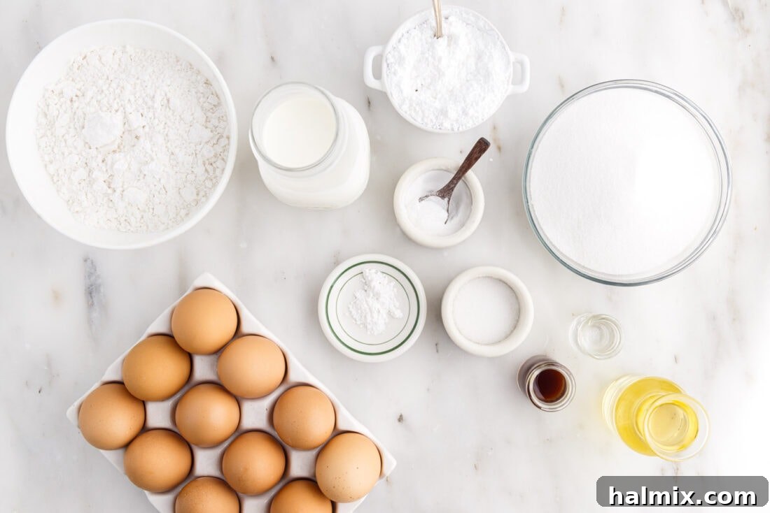 Ingredients for a classic Chiffon Cake laid out, including flour, sugar, eggs, and oil