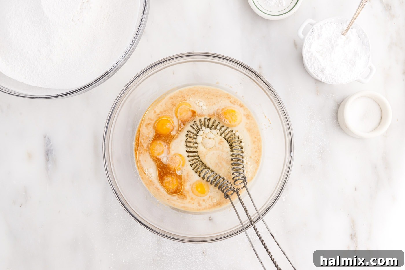 Whisking egg yolks with oil, milk, and extracts for Chiffon Cake