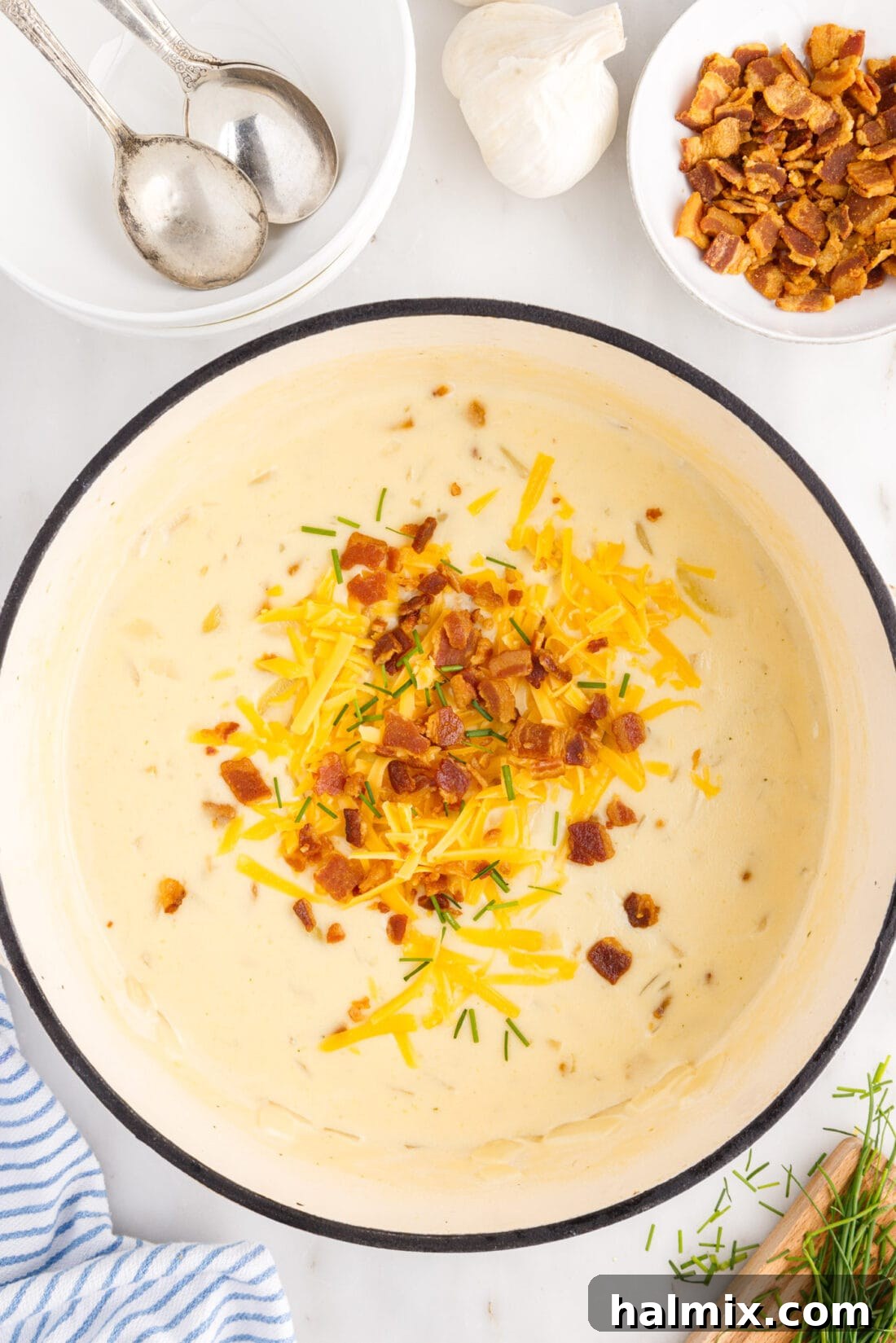 Hearty Loaded Baked Potato Soup 3 A large pot filled with rich, creamy Baked Potato Soup, ready to be served.