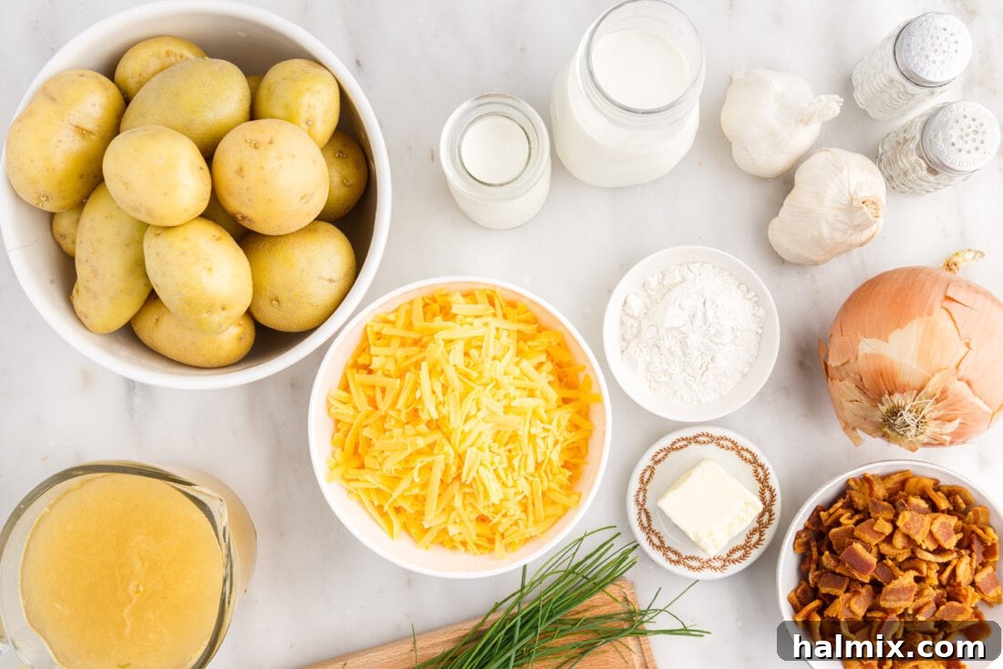 Hearty Loaded Baked Potato Soup 4 A collection of fresh ingredients neatly arranged on a counter, including potatoes, cheese, bacon, milk, and herbs, ready for making Baked Potato Soup.