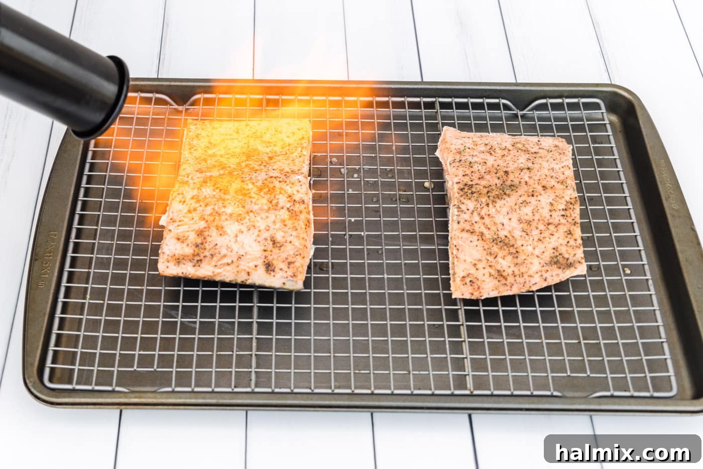 searing salmon filets with a kitchen torch
