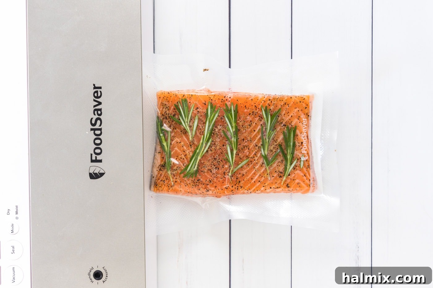 vacuum sealed salmon filets and herbs