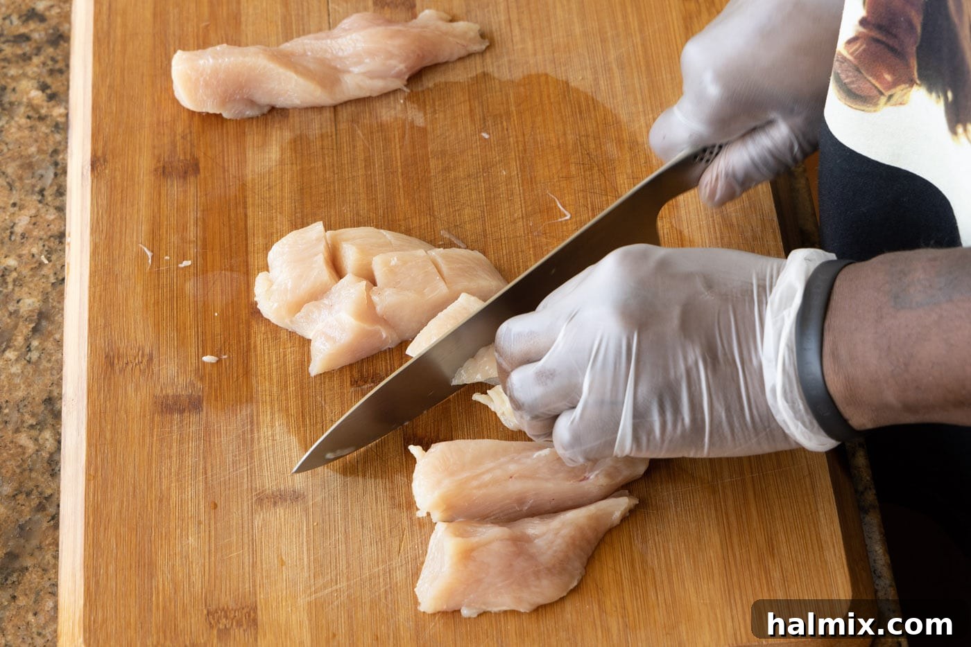 chopping chicken with a chef knife