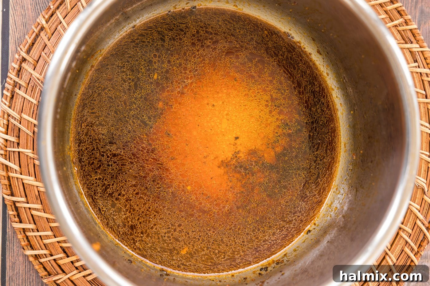 soy sauce, liquid smoke, and chicken broth added to the Instant Pot after searing