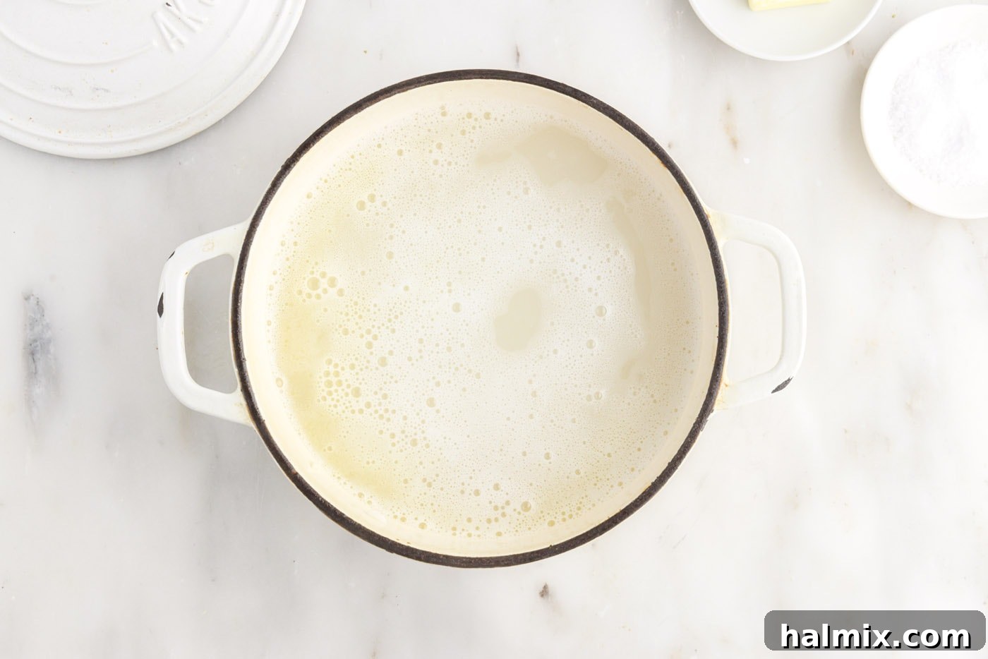 Rice and excess water in a large pot for the pasta method