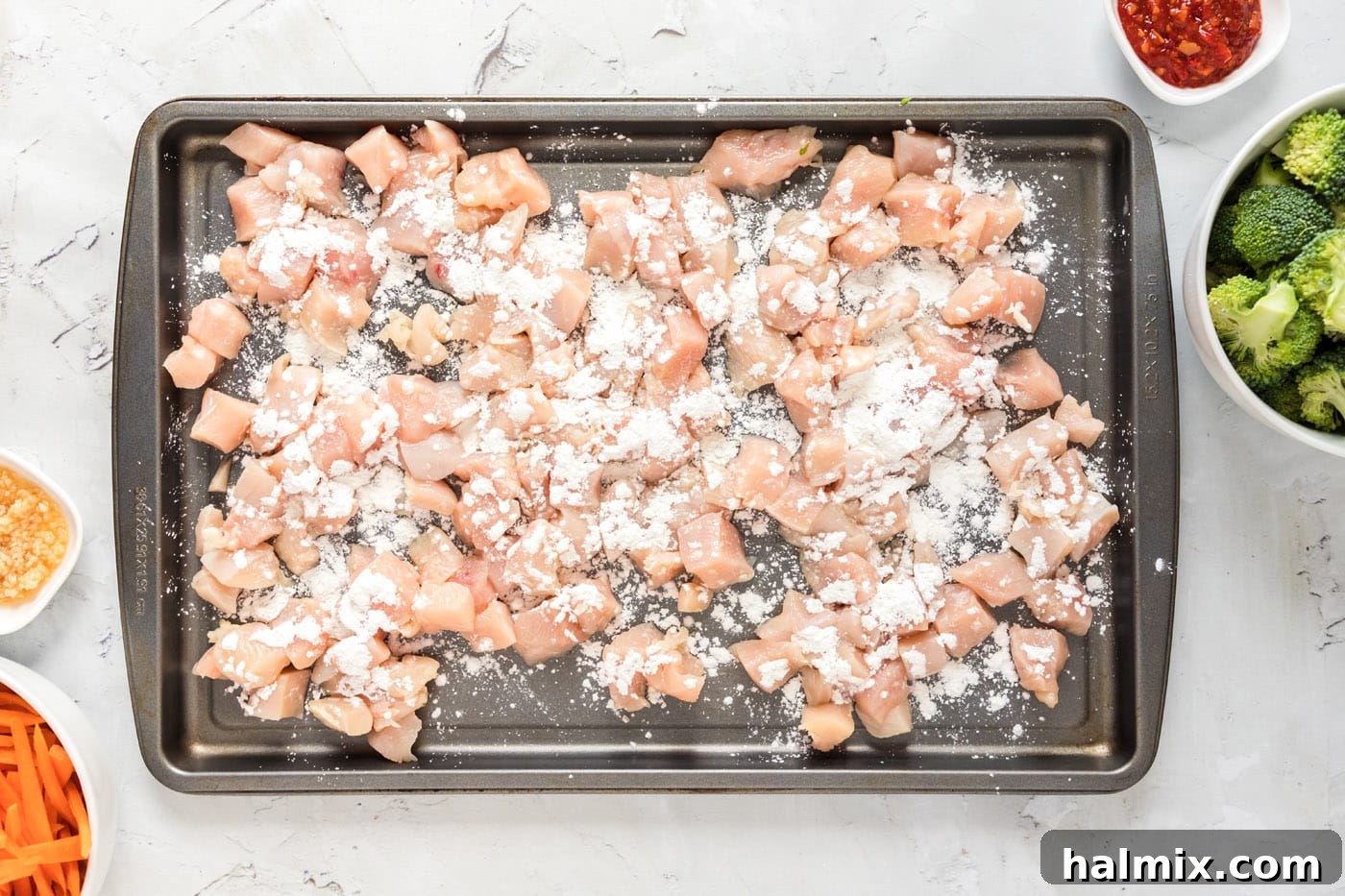 coating chicken pieces in cornstarch