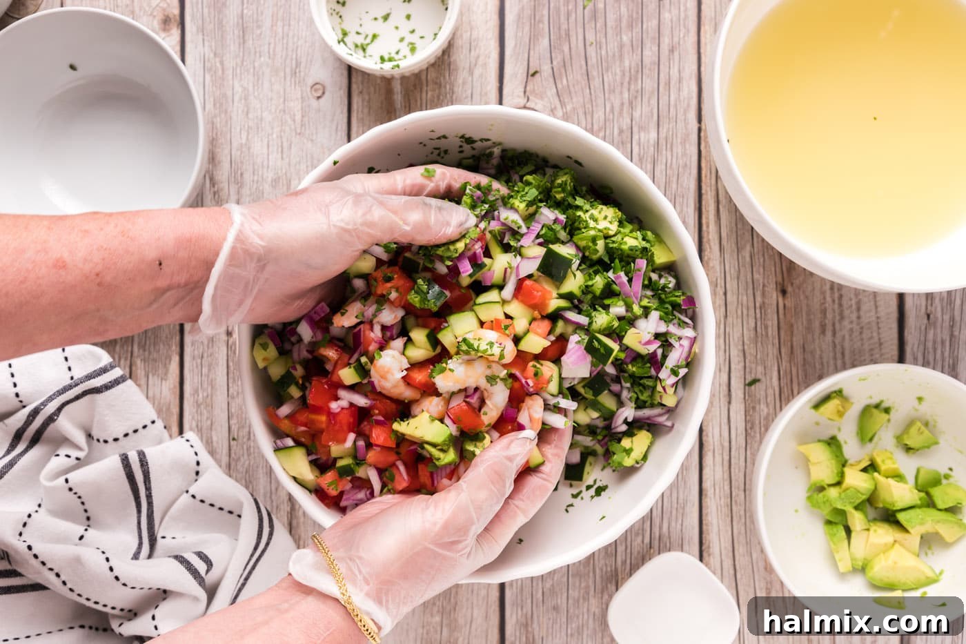 Zesty Shrimp Ceviche 13 tossing shrimp ceviche in a bowl