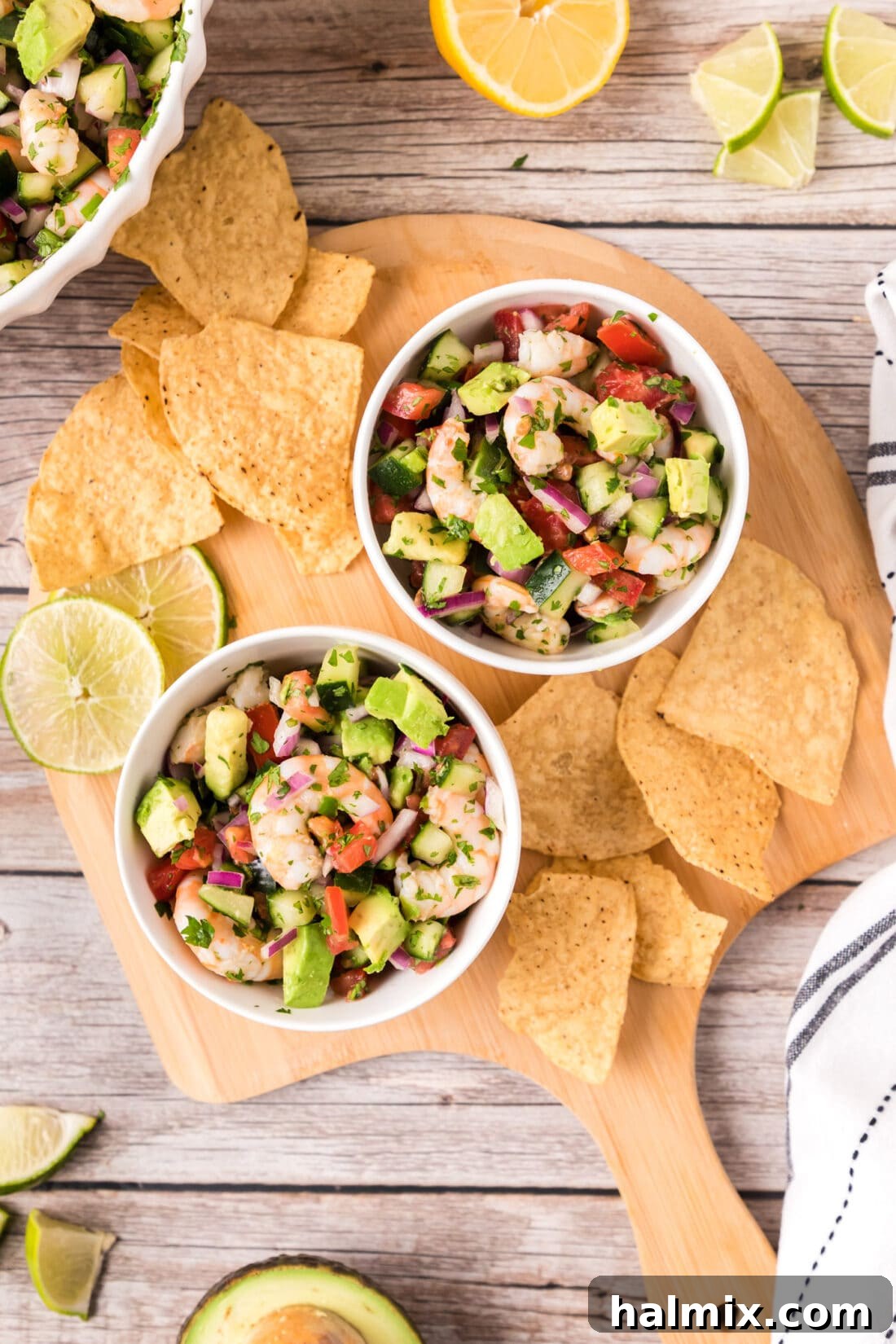 Zesty Shrimp Ceviche 3 Two bowls of Shrimp Ceviche on a platter with tortilla chips