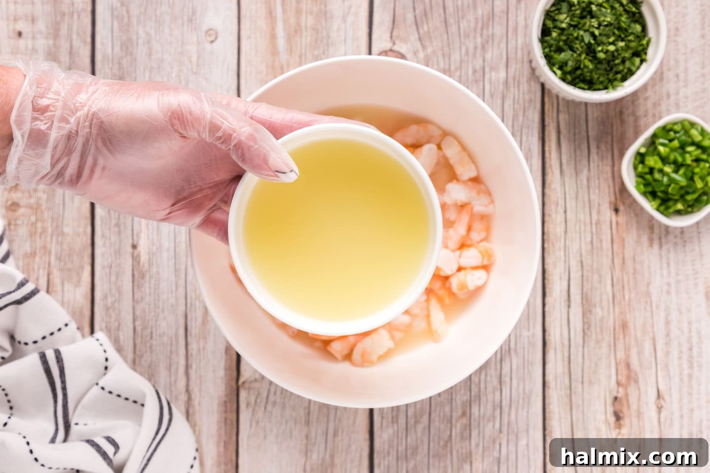 Zesty Shrimp Ceviche 9 adding lemon and lime juice to shrimp