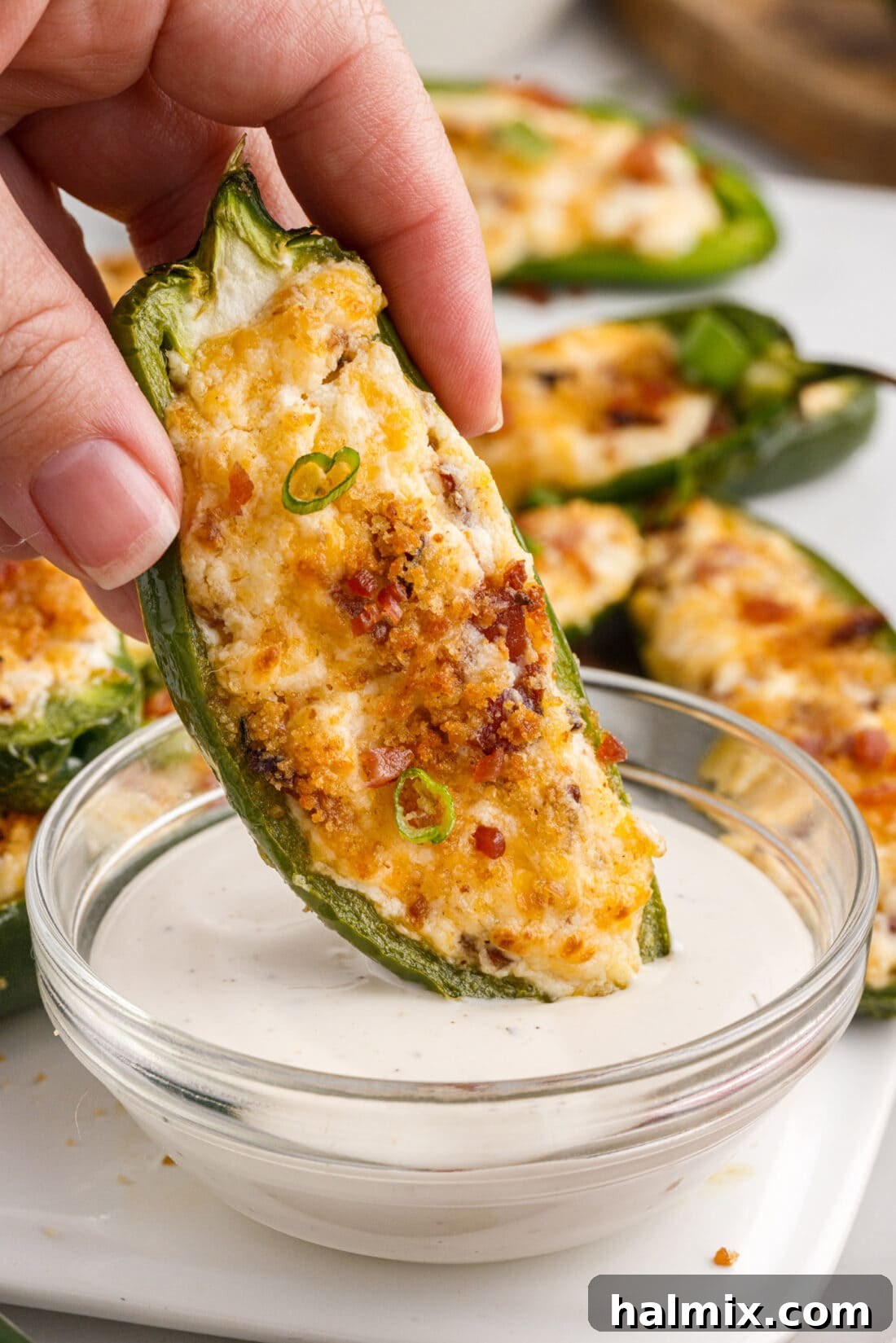 Air Fryer Jalapeno Popper dipped in ranch