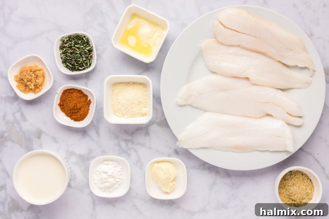 Ocean's Ancient Dweller 4 Ingredients for Orange Roughy laid out on a cutting board, including fish fillets, butter, garlic salt, and Old Bay seasoning.