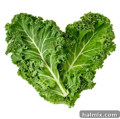 Low Carb Vegetables: Your Essential Guide to What to Eat and What to Skip 5 Fresh kale leaves arranged in a heart shape, symbolizing health and nutrition.