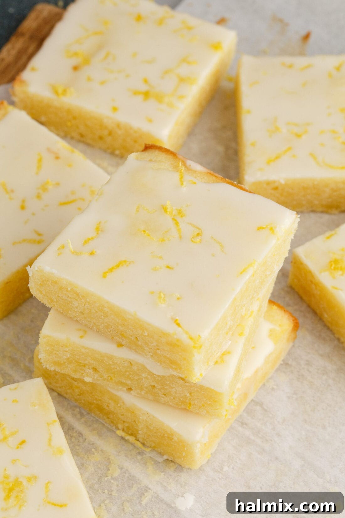 Stack of Lemon Brownies with Lemon Brownie squares next to it