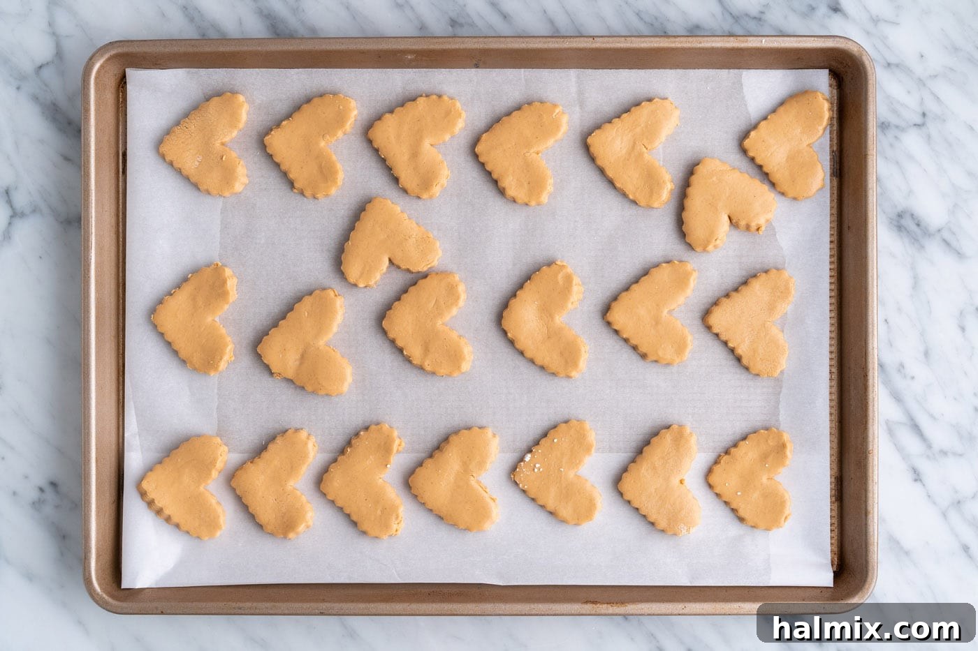 Sweetheart Chocolate Peanut Butter Treats 11 heart shaped peanut butter bars on a baking sheet