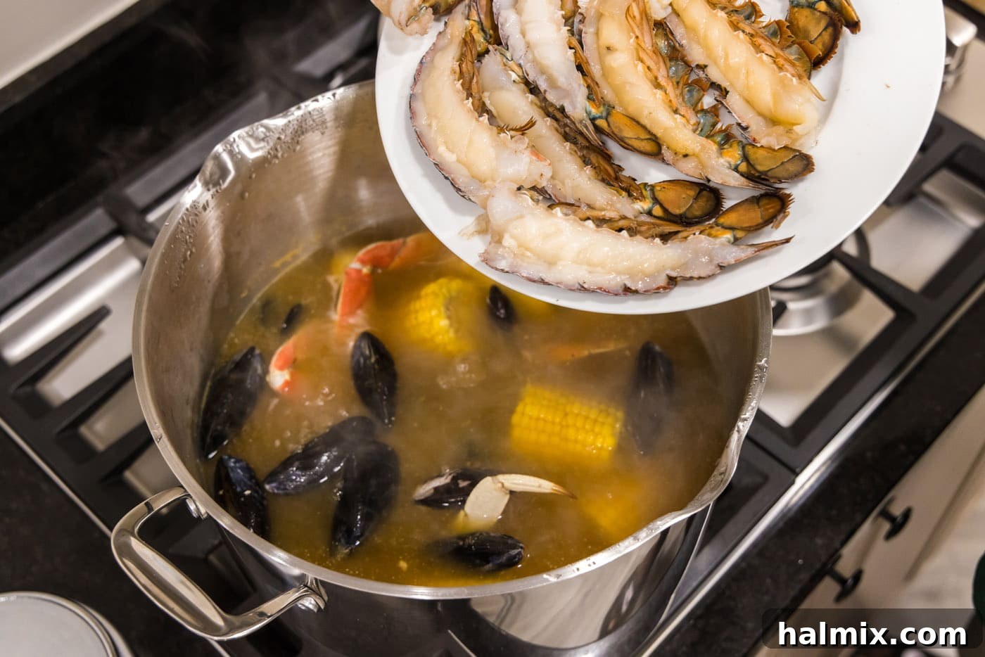 Ocean's Harvest Feast 9 adding lobster tails to seafood boil