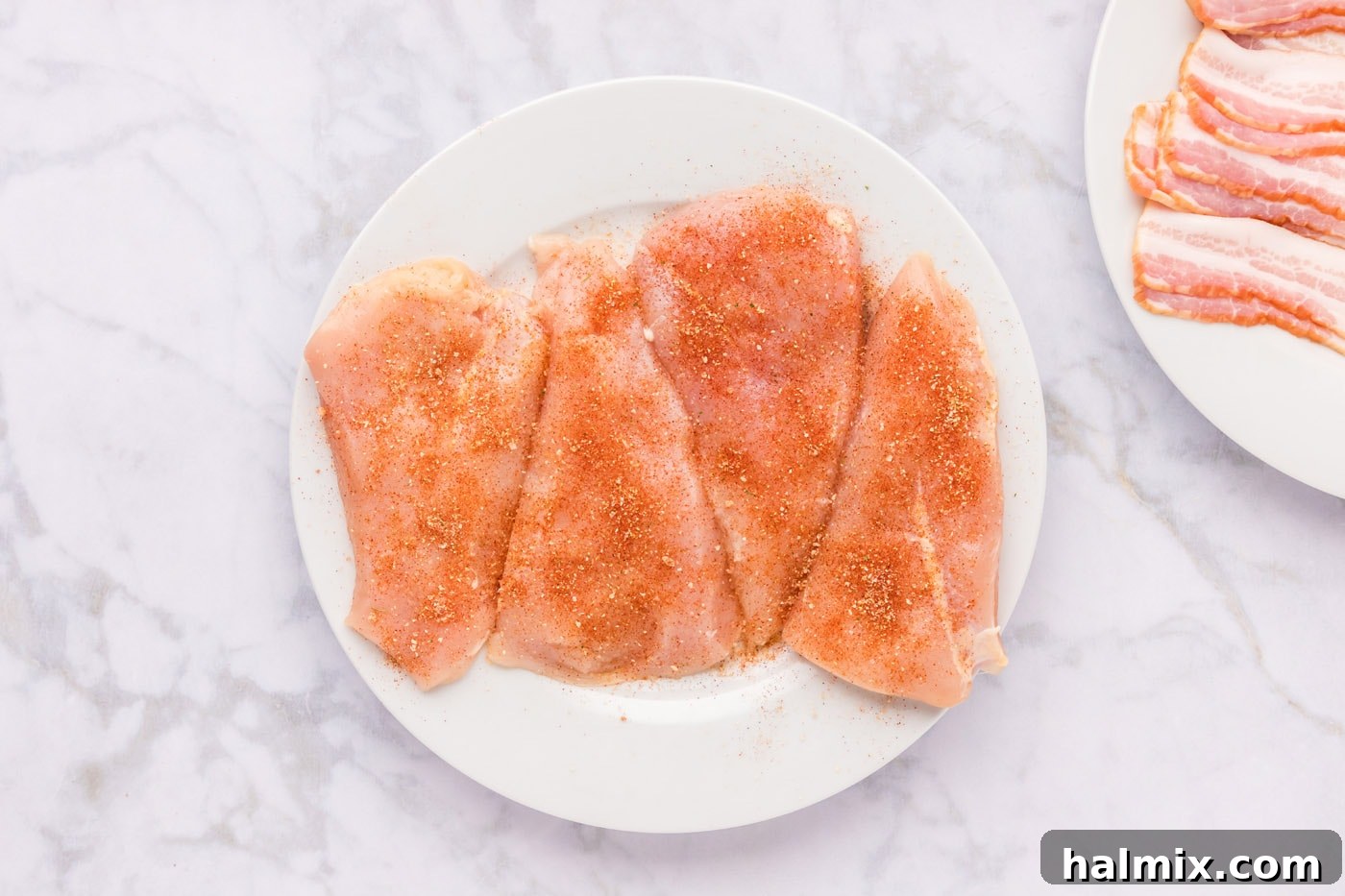 Crispy Bacon Chicken Bundles 6 seasoned chicken breasts on a plate