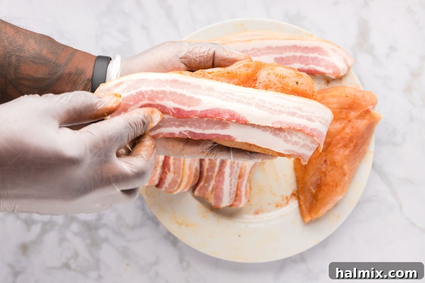 Crispy Bacon Chicken Bundles 7 bacon strips on top of seasoned chicken breasts