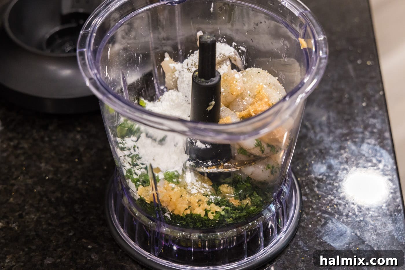 Crispy Golden Shrimp Toast 5 Blending shrimp toast ingredients in a food processor to create a smooth paste