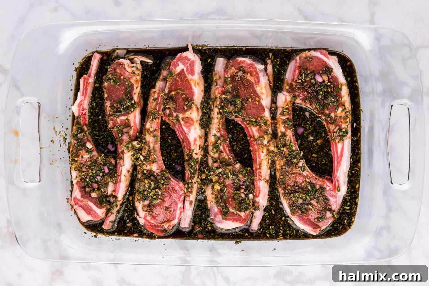 Ultimate Lamb Chop Marinade 6 lamb chops sitting in marinade