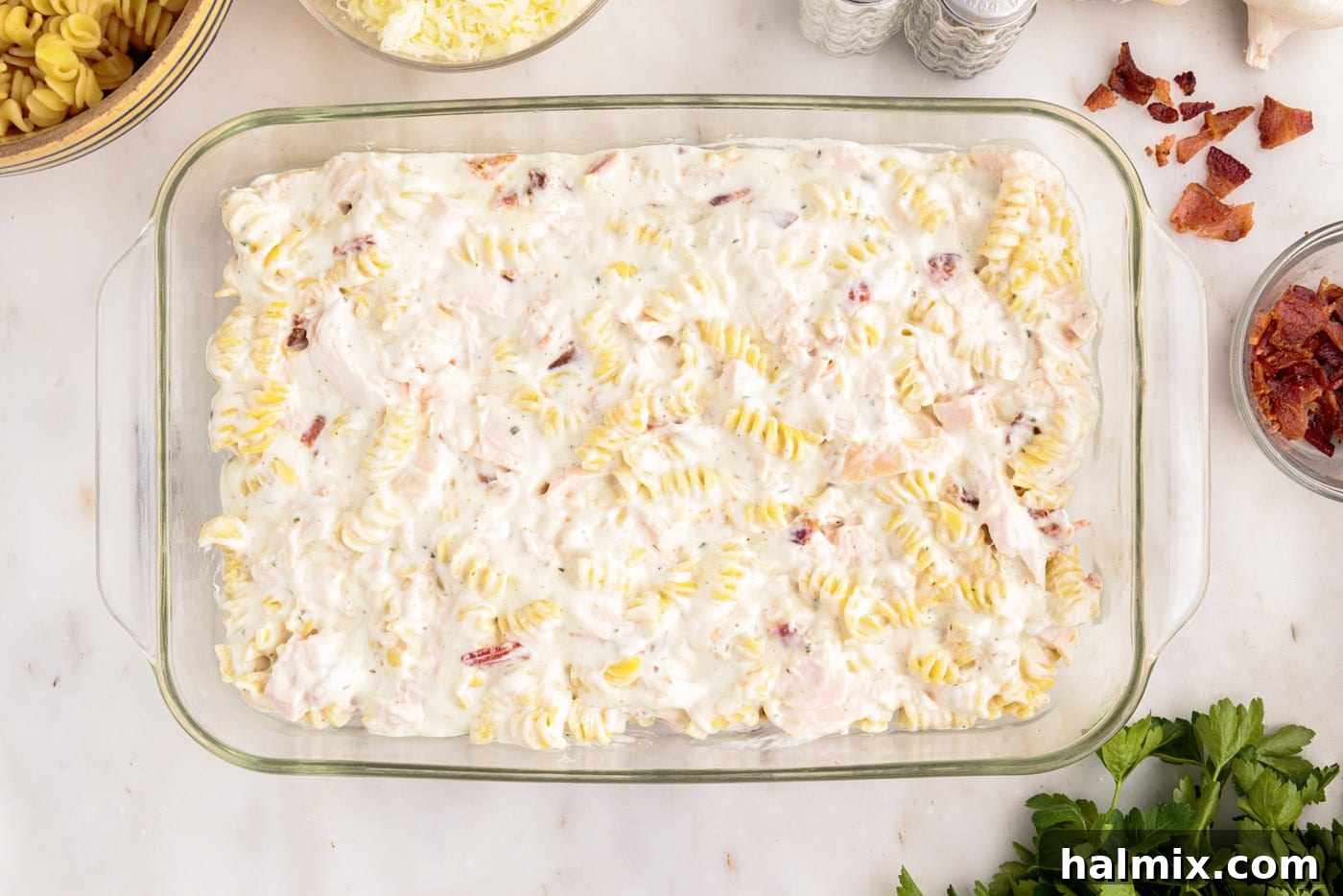 chicken bacon ranch casserole in a baking dish