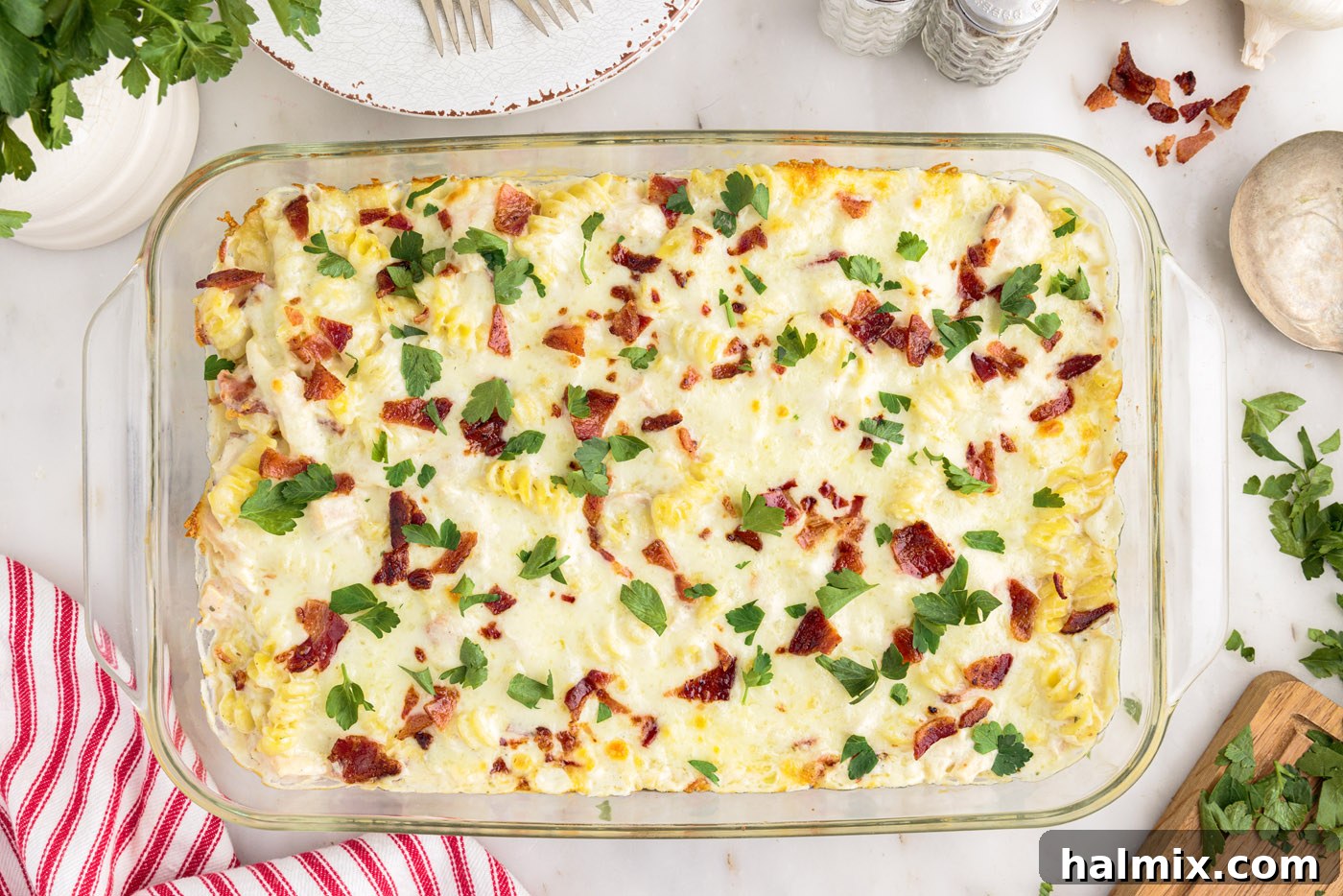bacon chicken ranch casserole with chopped parsley overhead