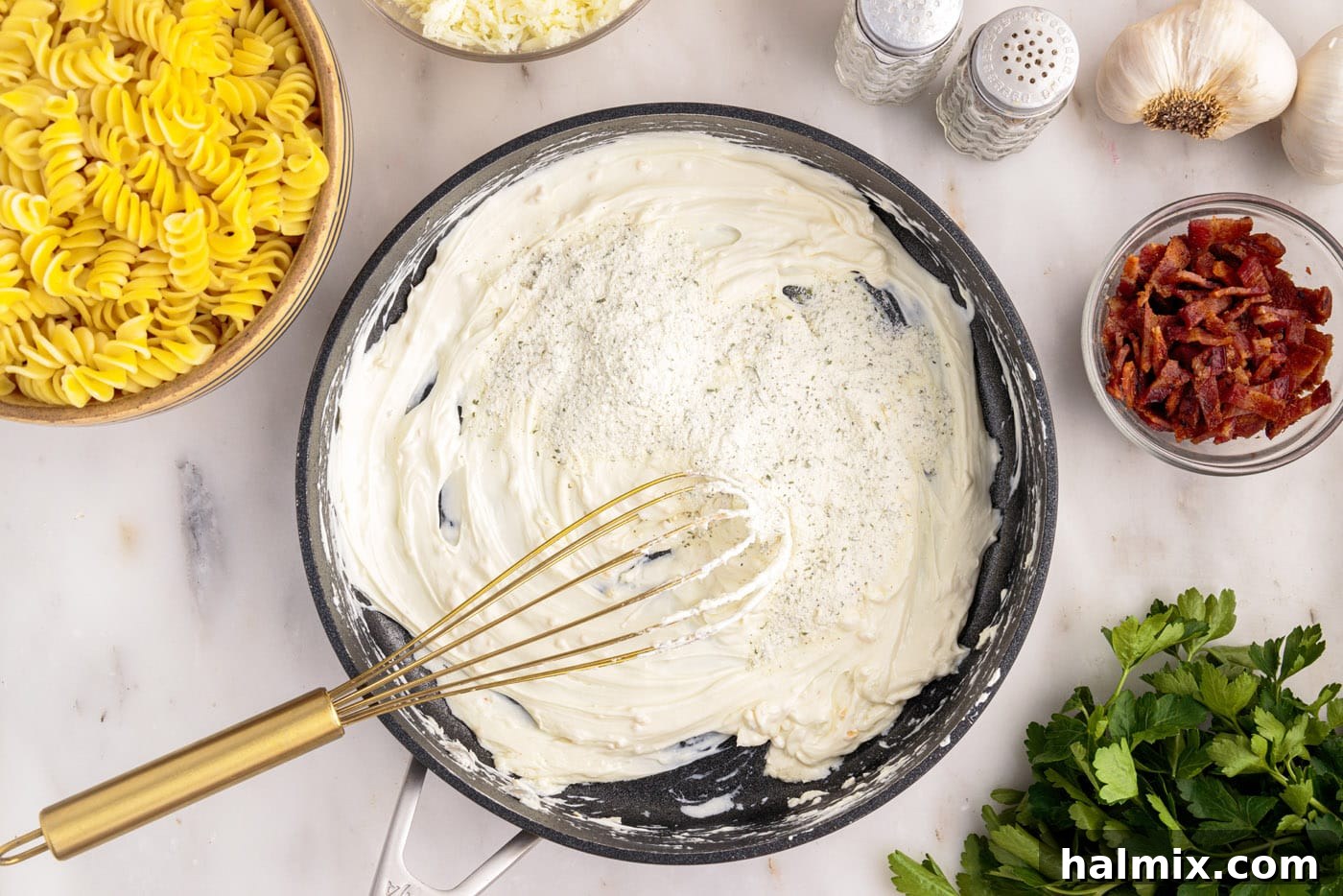 whisking ranch seasoning mix into cream cheese in a skillet