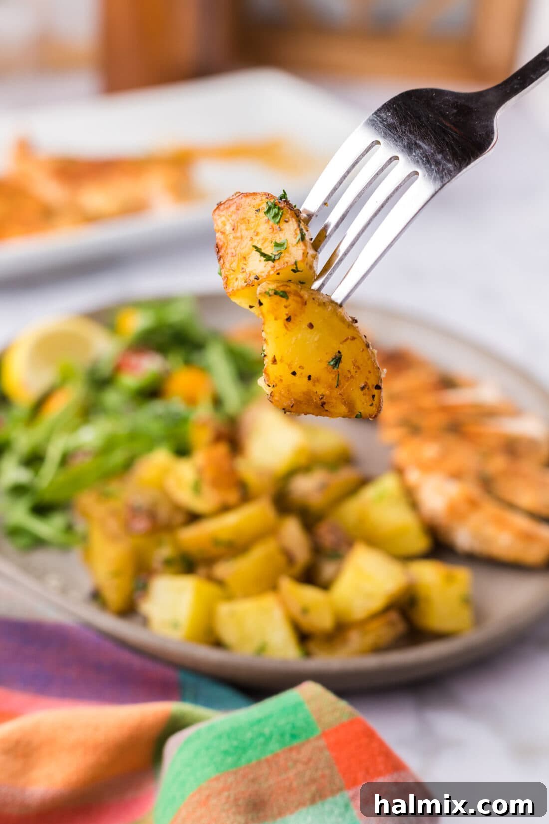 Garlic Roasted Potatoes on a fork