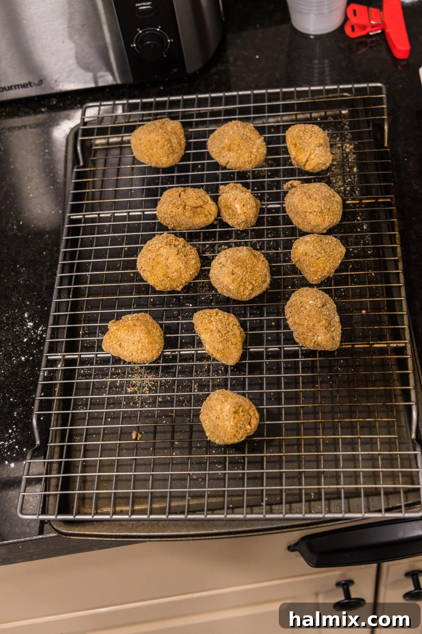 Golden Seared Scallops 11 dredged scallops on a wire rack