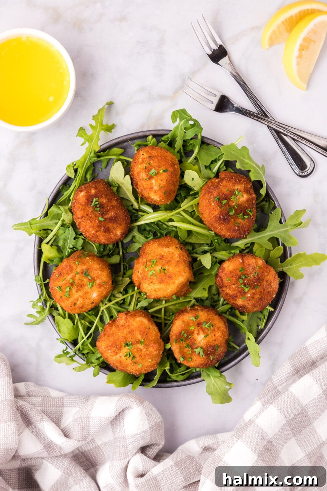 Golden Seared Scallops 3 Fried Scallops on a bed of greens