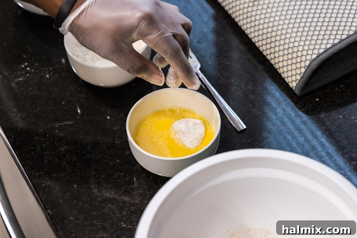 Golden Seared Scallops 8 dipping floured scallop in egg