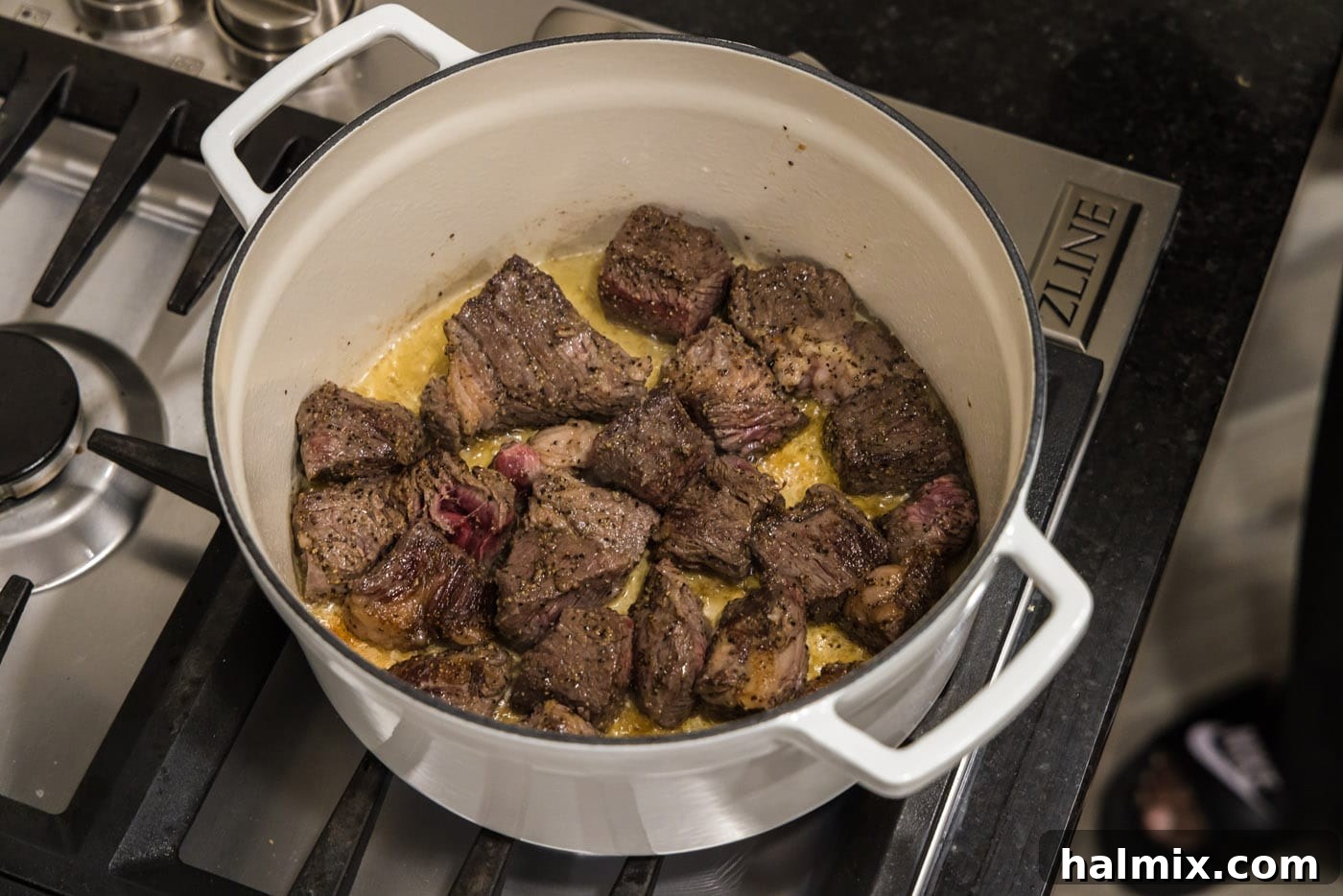 seared beef chuck roast in a dutch oven