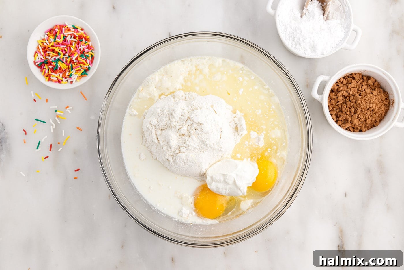 Easy Cake Mix Donuts 5 cake mix donut ingredients in a large mixing bowl