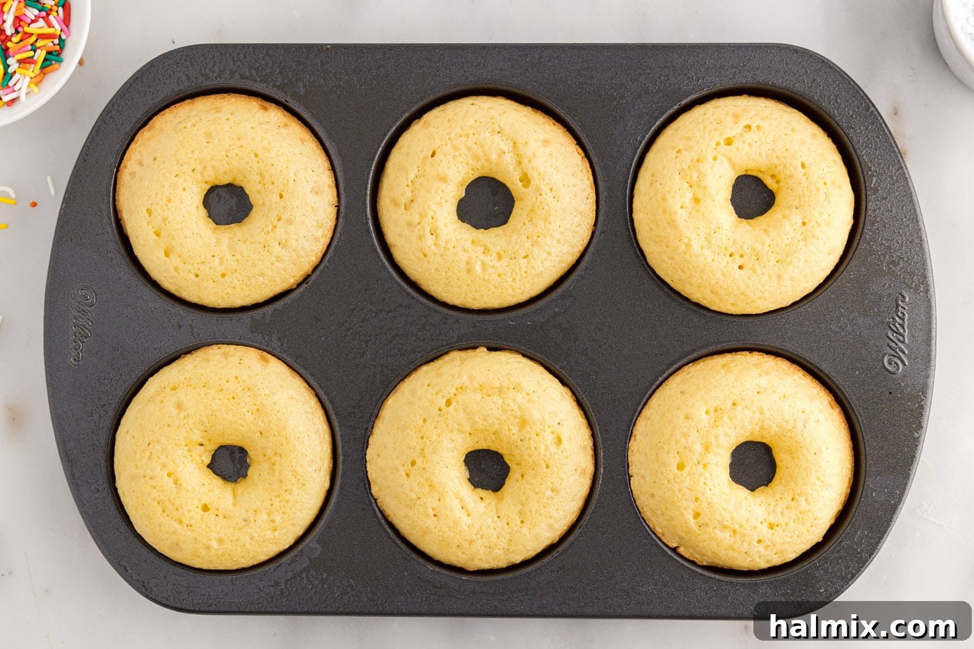 baked cake mix donuts in a pan