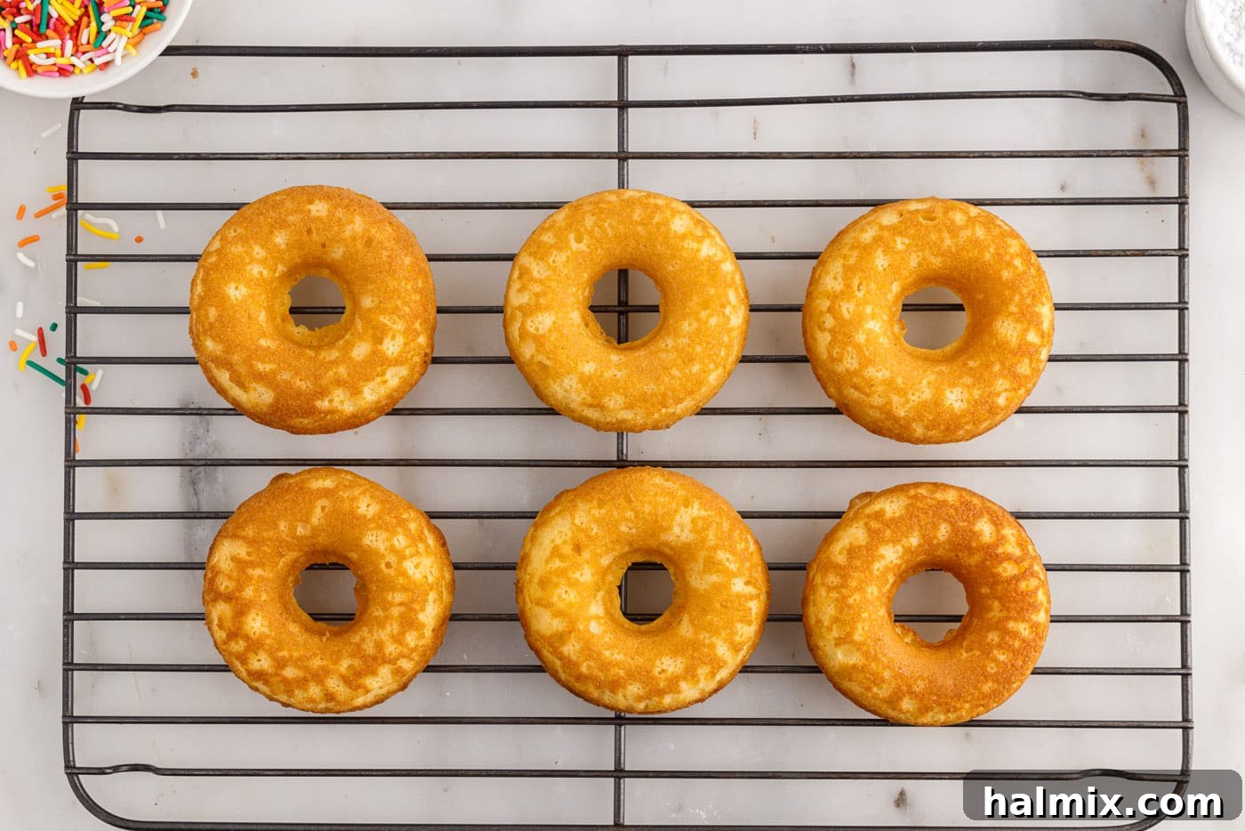 donuts cooling on a wire rack