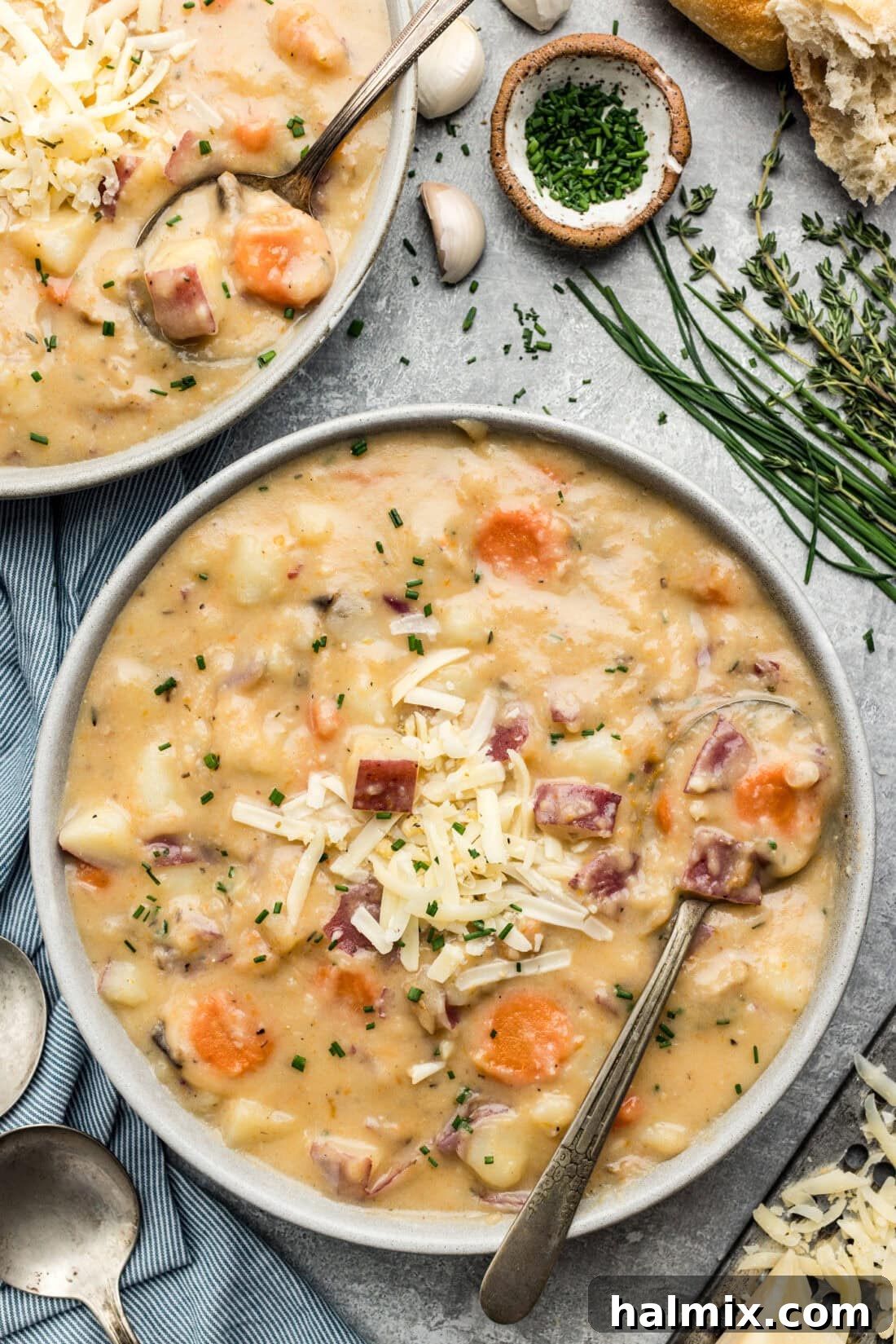 Bowl of Garlic Potato Soup with a spoon in it
