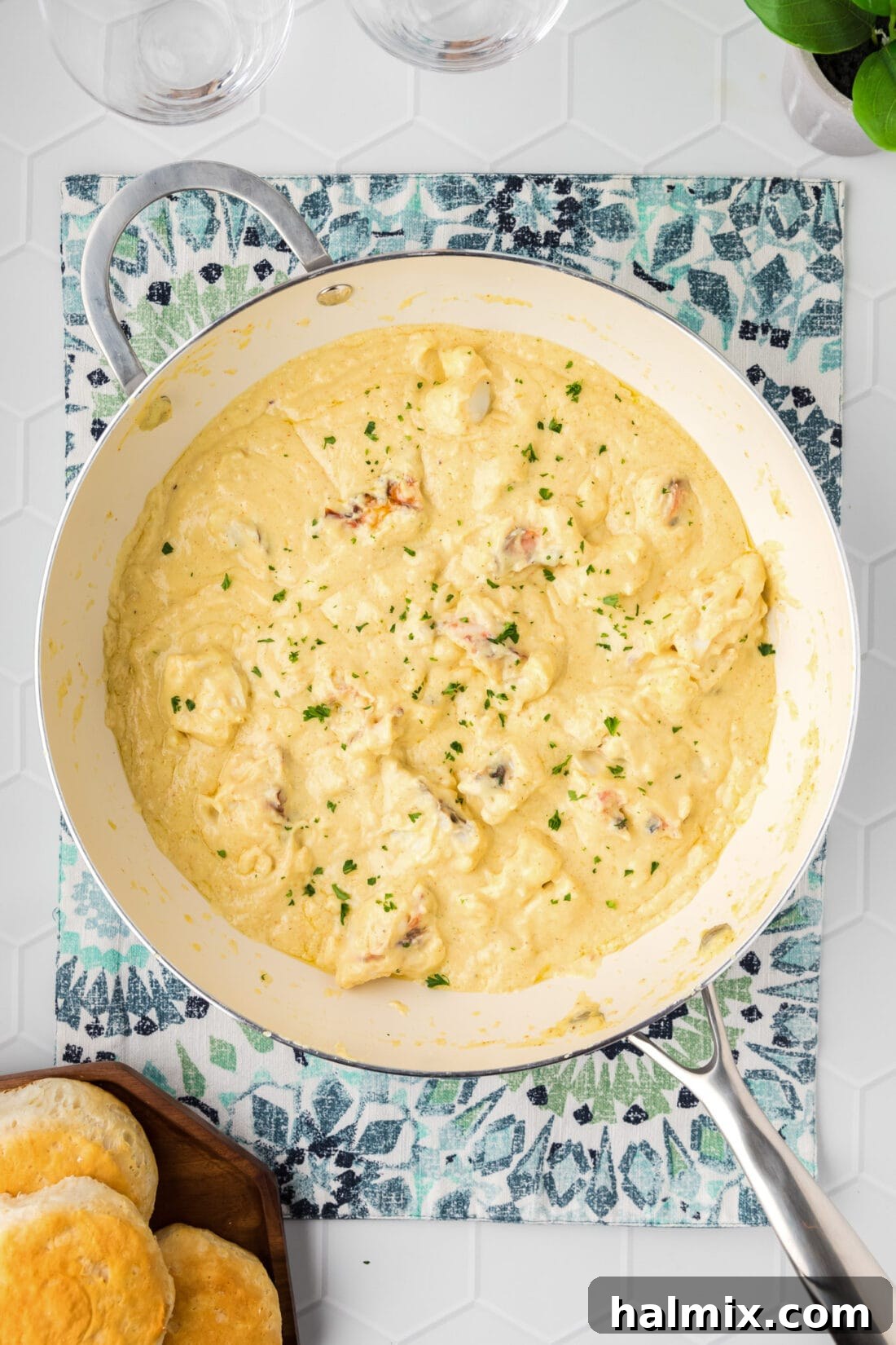 Skillet of Lobster Newburg with biscuits on the side