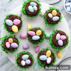 Whimsical Easter Nest Cupcakes 15 Overhead photo of Easter Nest Cupcakes on a cake stand