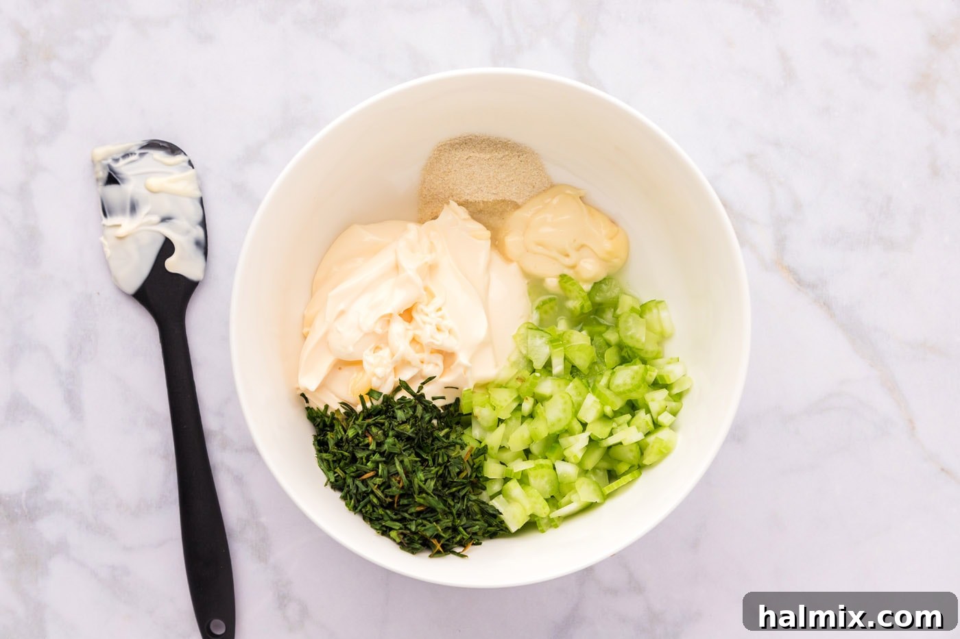 shrimp roll ingredients in a mixing bowl