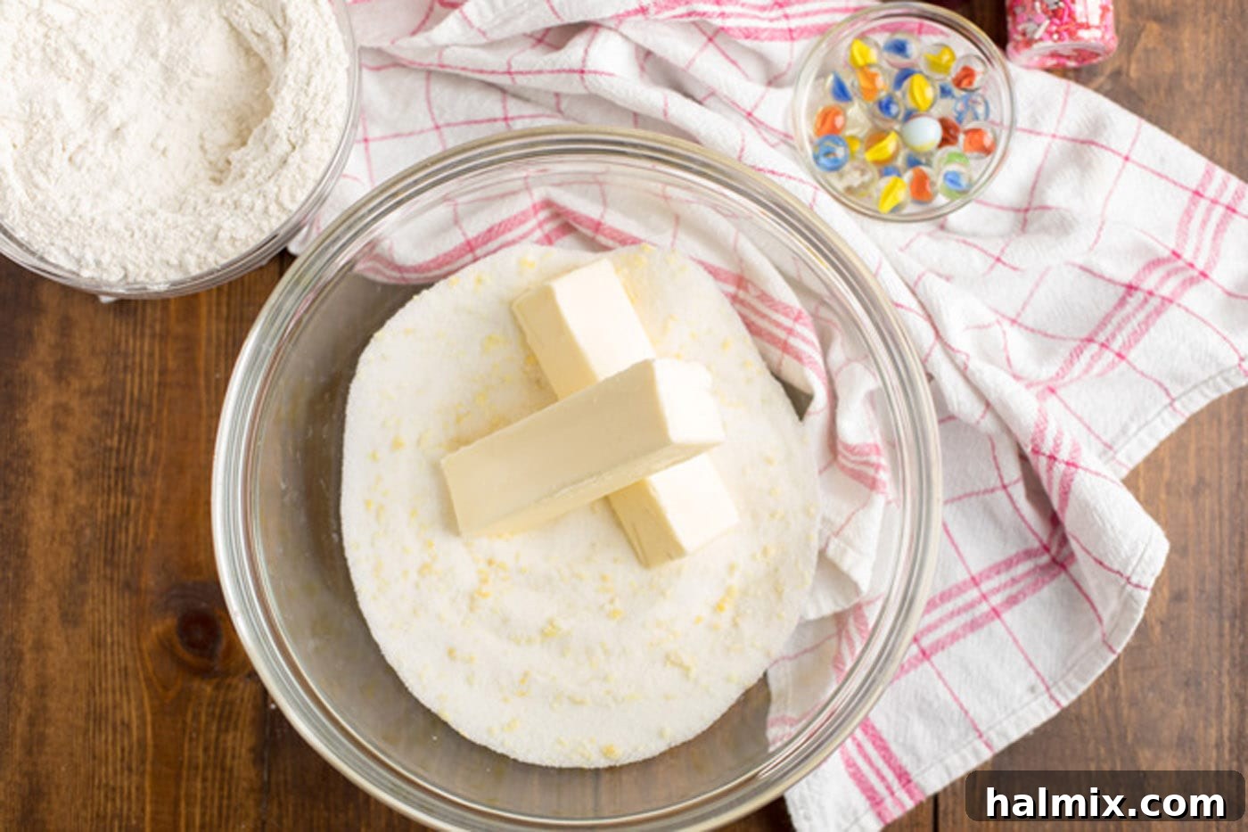 Sugar mixture and butter in a bowl being creamed together.
