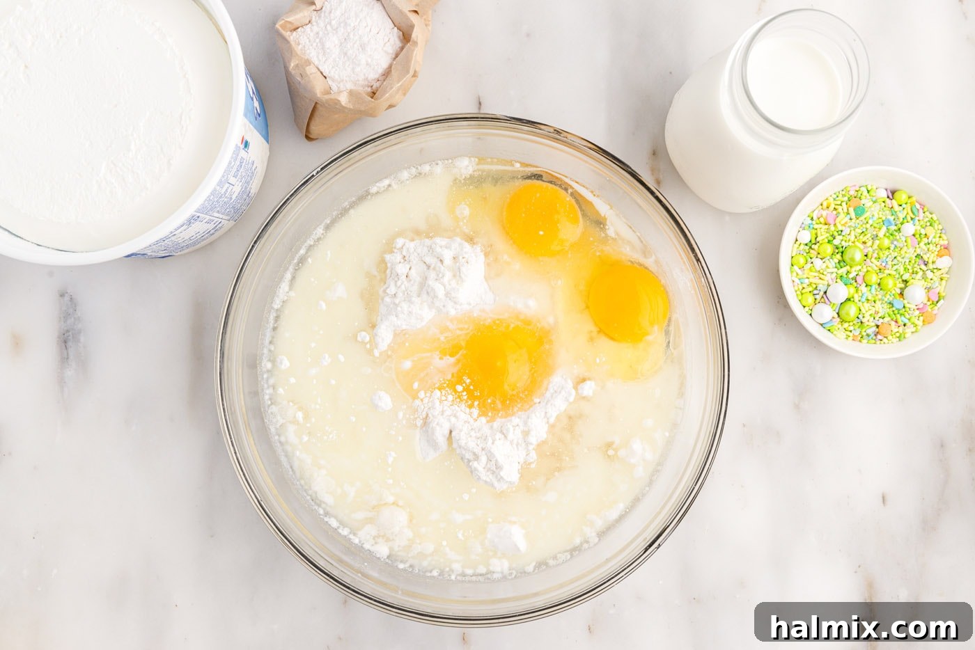 eggs, oil, milk, and cake mix in a bowl