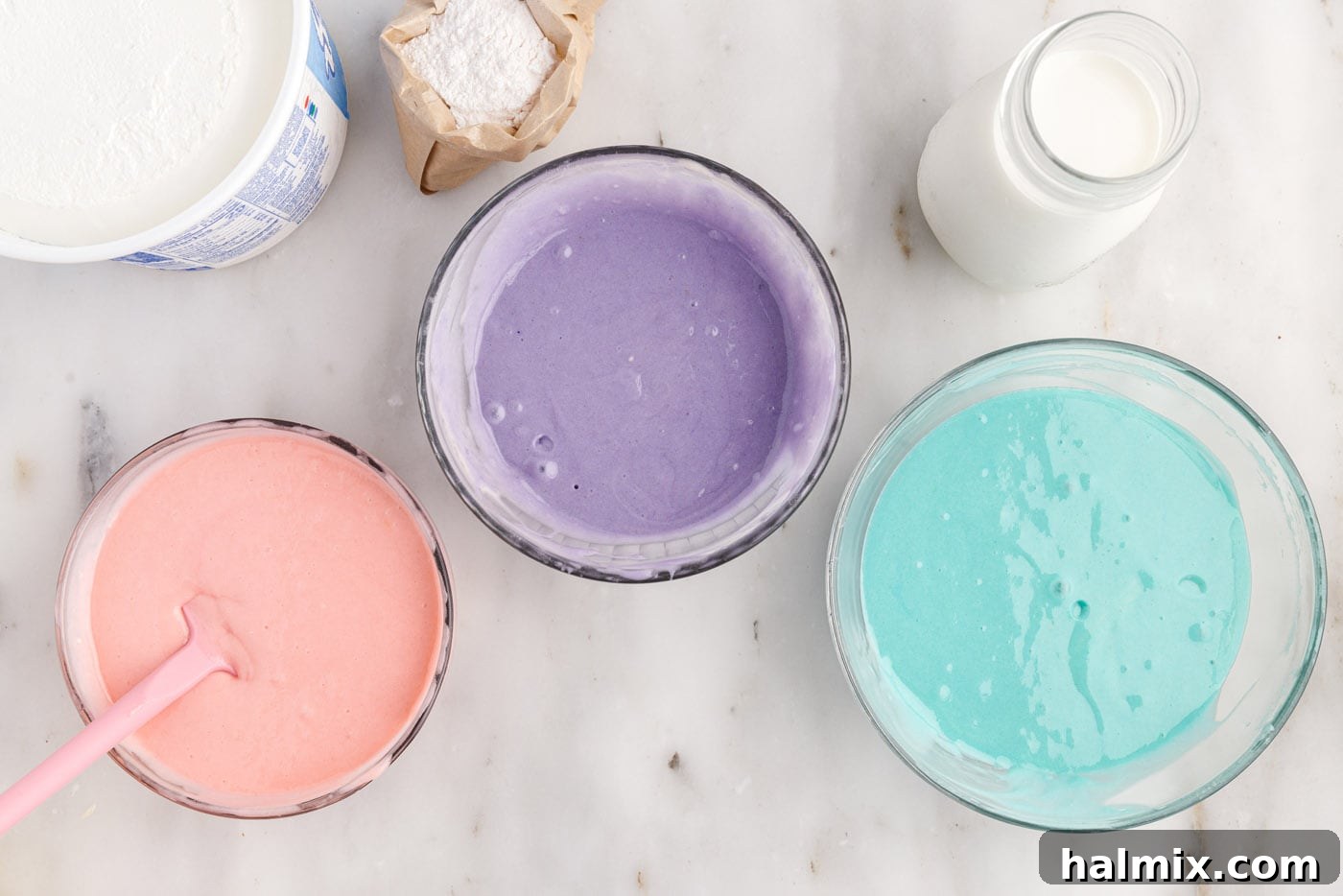 pastel pink, purple, and blue cake batter