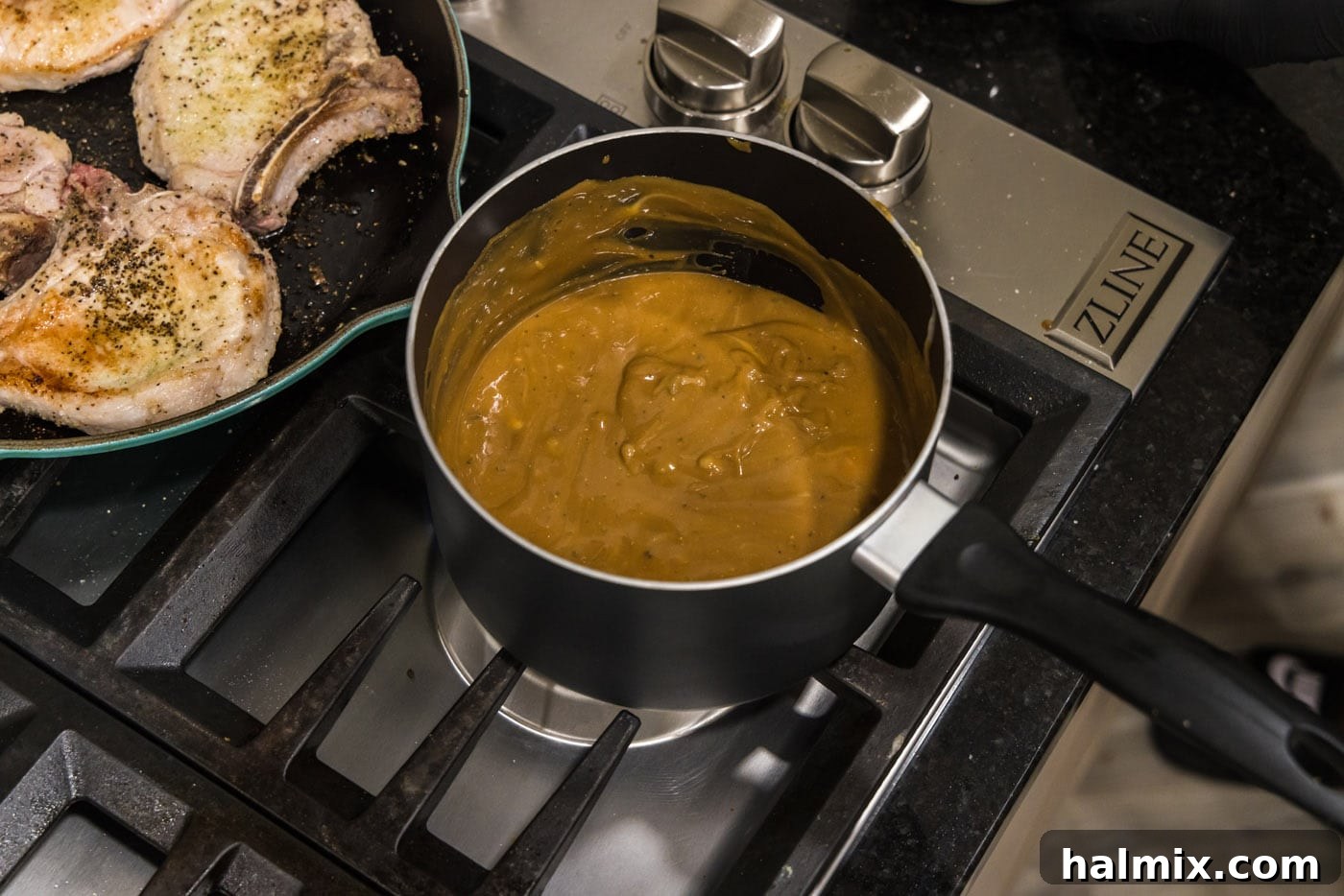 pork chop brown gravy in a saucepan