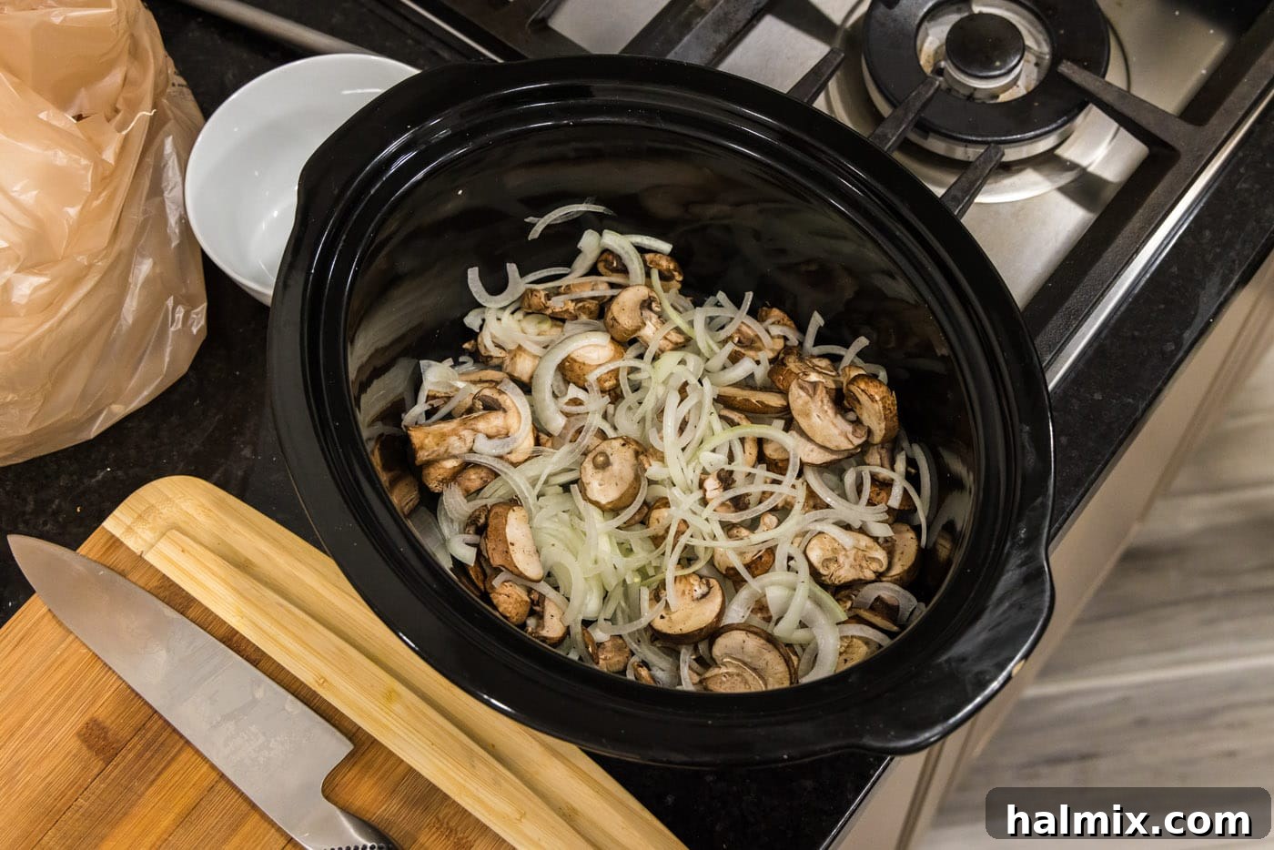 mushrooms and onions in a slow cooker